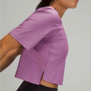 Lululemon Mesh Back Cropped Train Tshirt in Wisteria Purple, Size 4